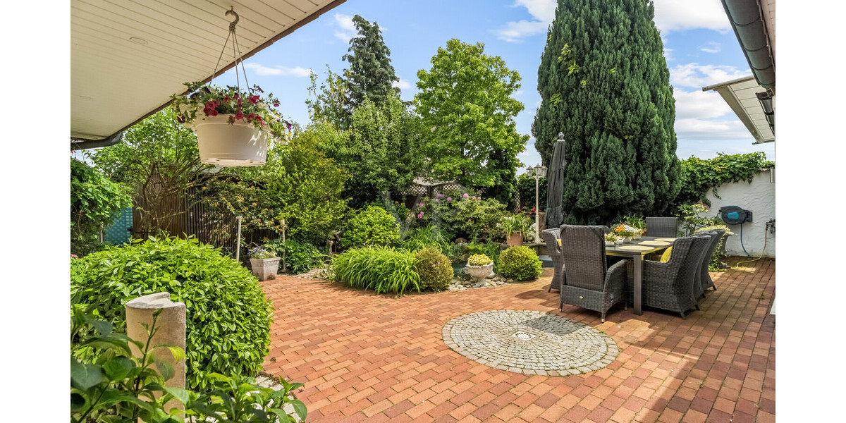 Stilvoller Bungalow mit Wintergarten & Kamin – Wohnen auf einer Ebene in idyllischer Lage - Einfamilienhaus Rheine / Elte Rheine | Angebot:26781763