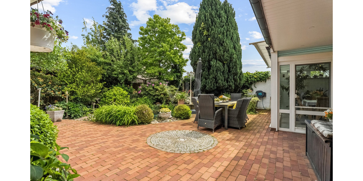 Stilvoller Bungalow mit Wintergarten & Kamin – Wohnen auf einer Ebene in idyllischer Lage - Einfamilienhaus Rheine / Elte Rheine | Angebot:26781763